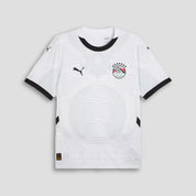 White sports jersey with black accents and brand logos on a light gray background