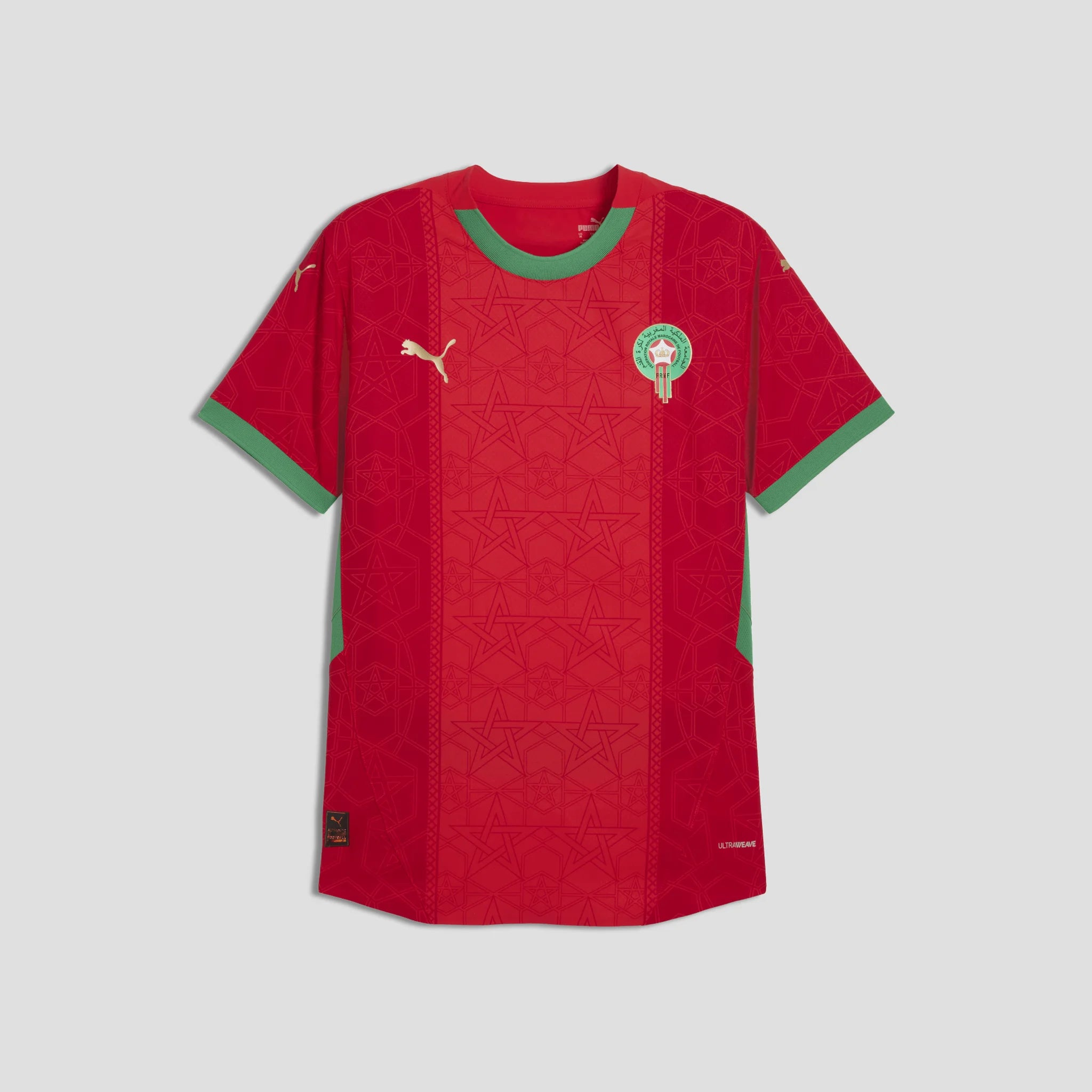Red soccer jersey with green accents on a light gray background