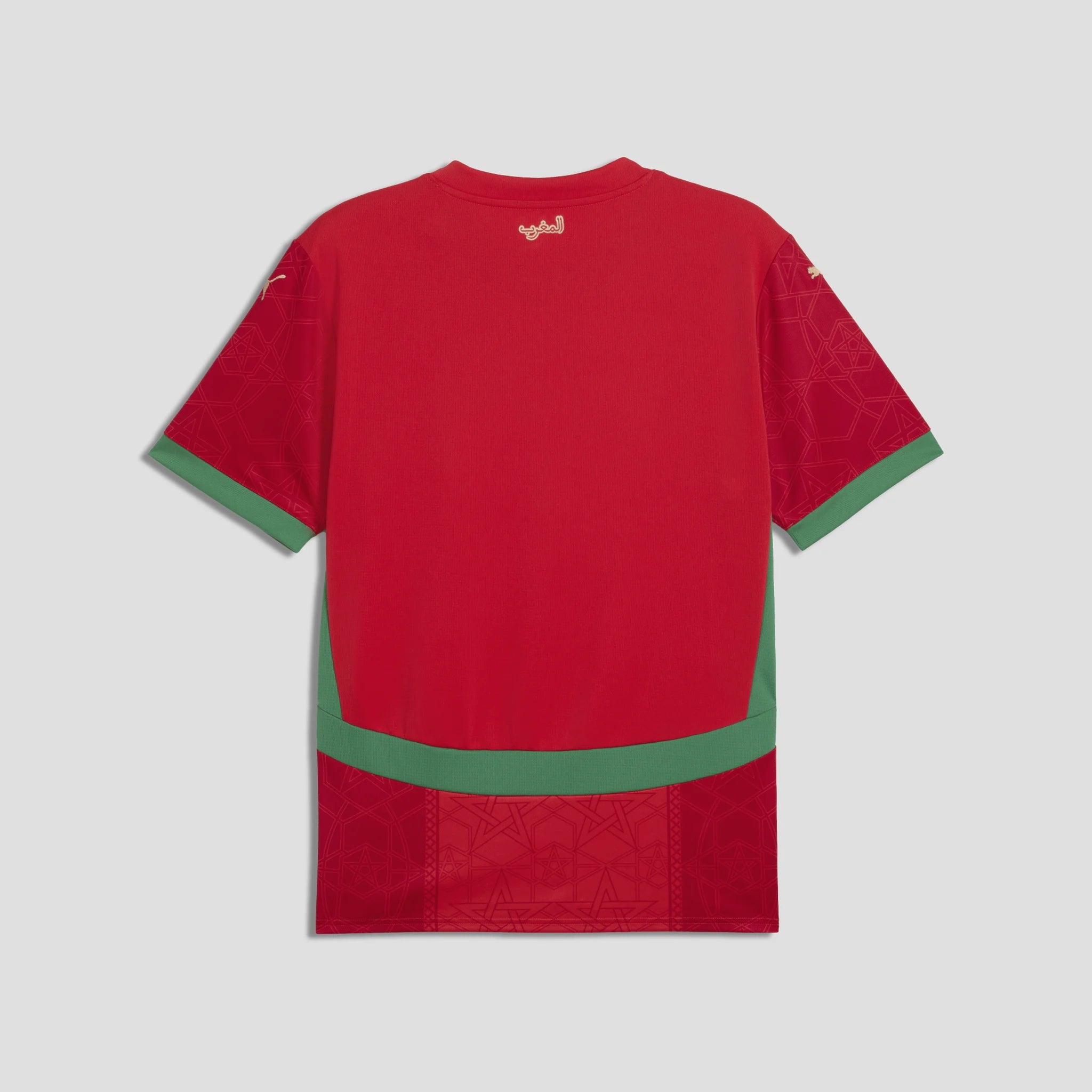 Red t-shirt with green accents on a light gray background