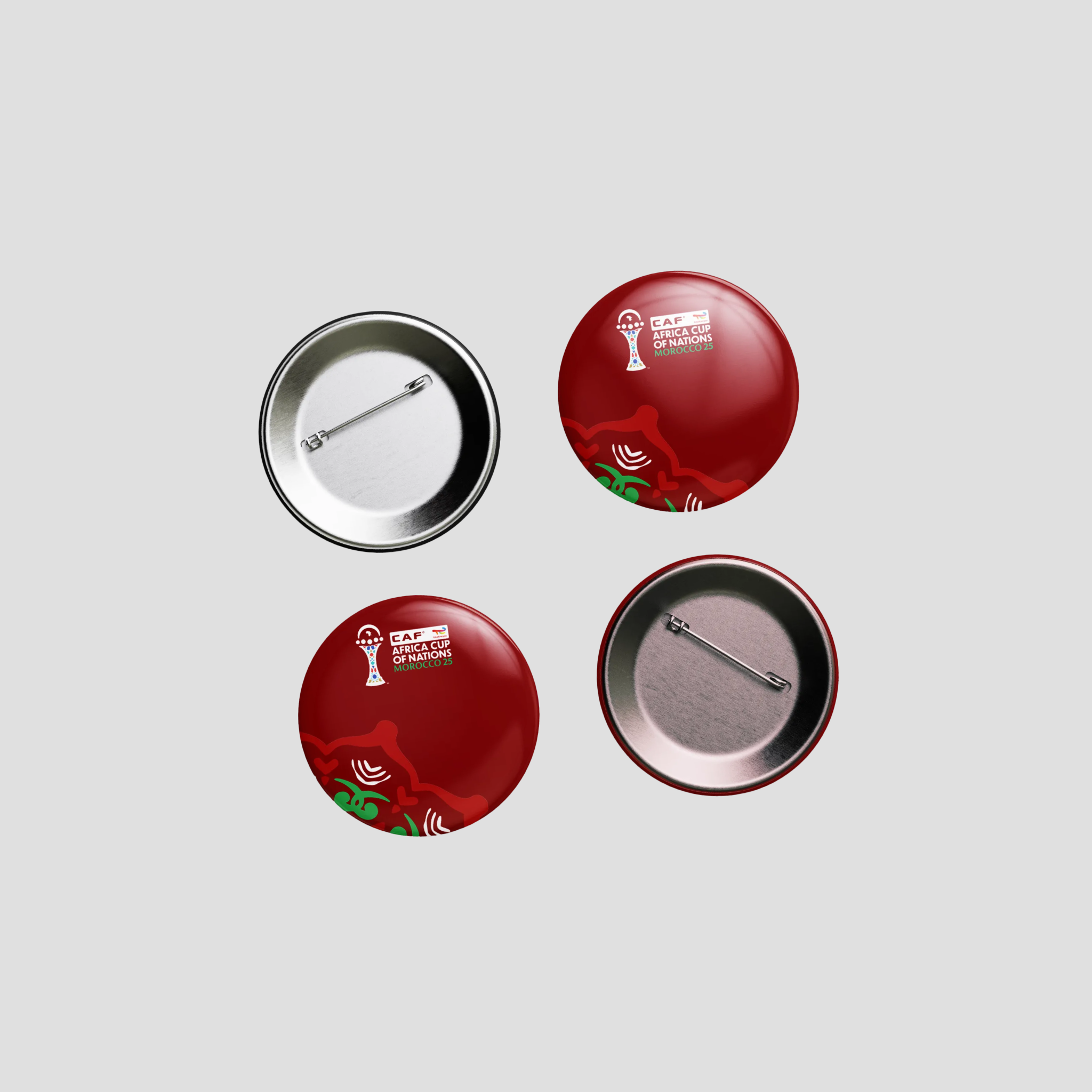 AFCON pins with different designs on a light gray background